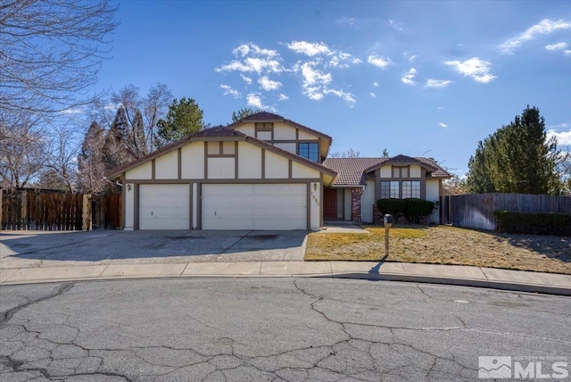 view of front of property with a garage