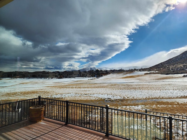 view of snow covered deck