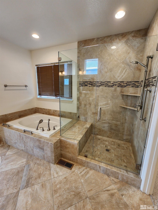 bathroom with independent shower and bath