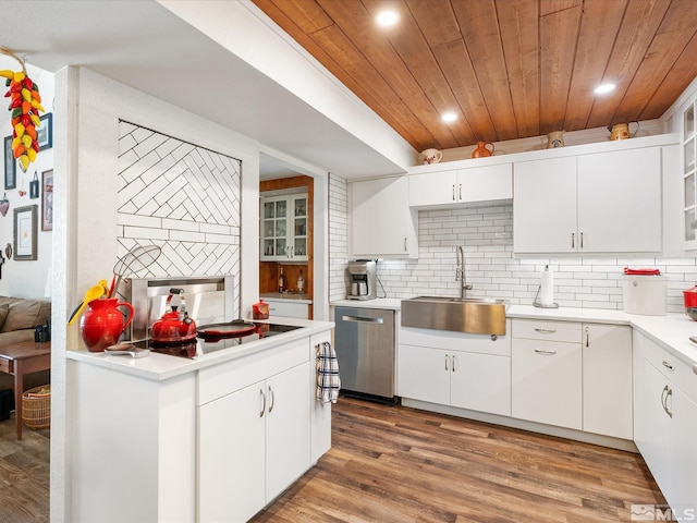 kitchen with white cabinetry, sink, backsplash, stainless steel dishwasher, and wood ceiling