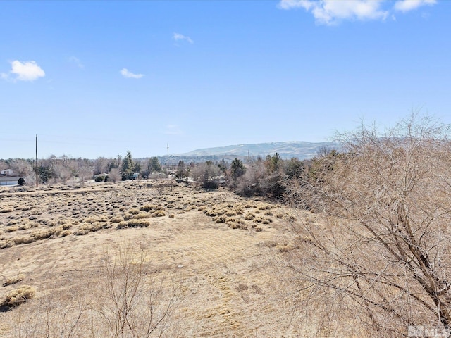 property view of mountains with a rural view