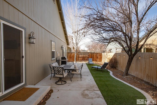 view of patio / terrace featuring a grill