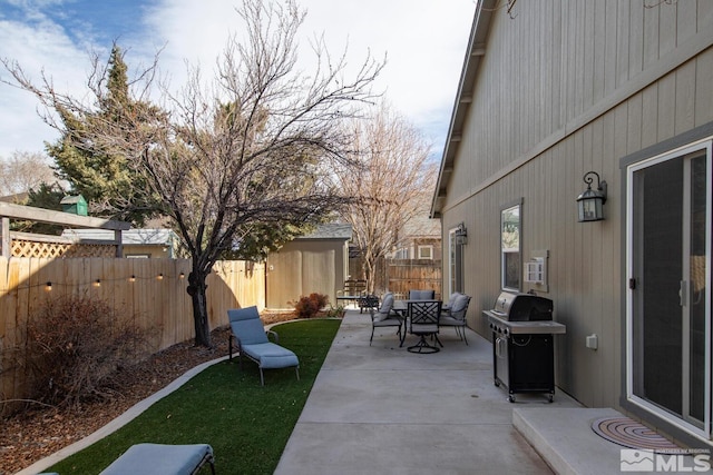 view of patio with a grill