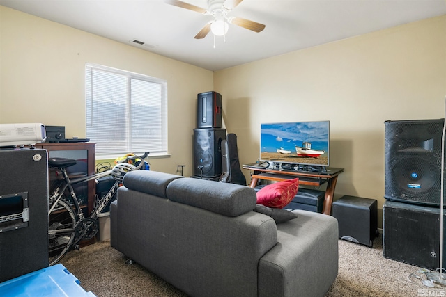 interior space featuring ceiling fan and carpet floors