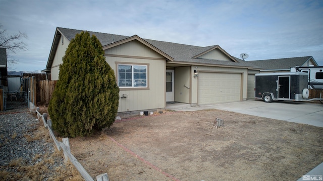 single story home featuring a garage