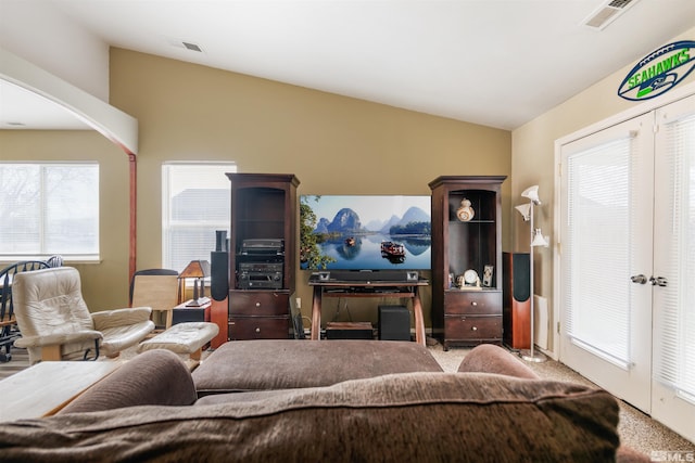 living room with vaulted ceiling