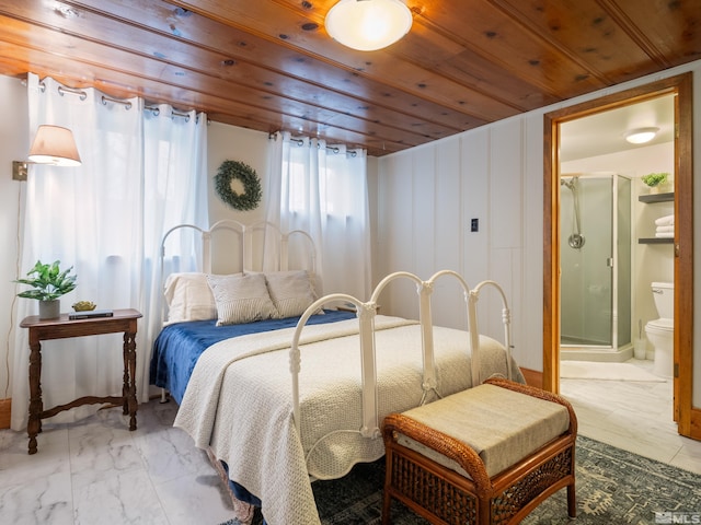 bedroom with wood ceiling and ensuite bath