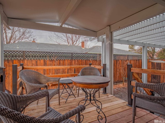 wooden terrace with a pergola