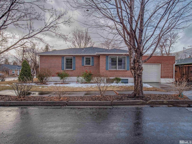 ranch-style home with a garage