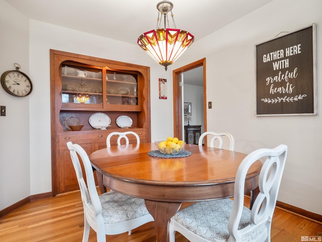 dining space featuring light hardwood / wood-style flooring