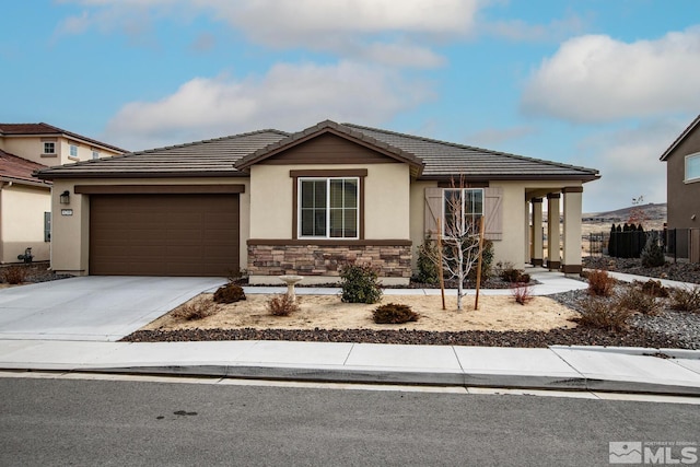 view of front of property featuring a garage