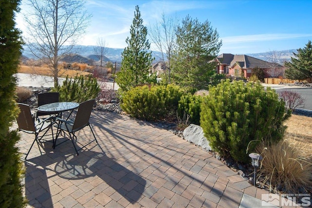 view of patio / terrace with a mountain view