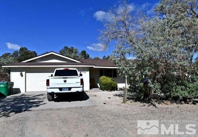 ranch-style house with a garage