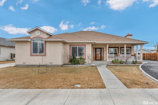 view of front of home with a front yard and a porch