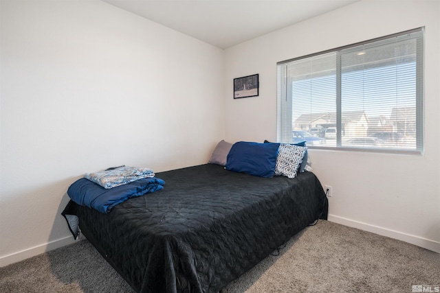 bedroom featuring carpet