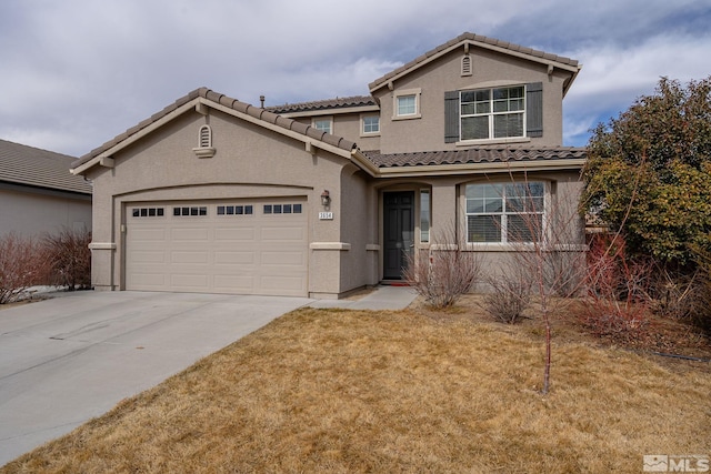 view of front of house with a front lawn and a garage