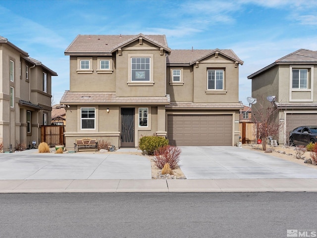 front facade with a garage