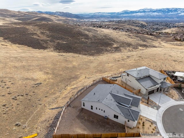 drone / aerial view featuring a mountain view