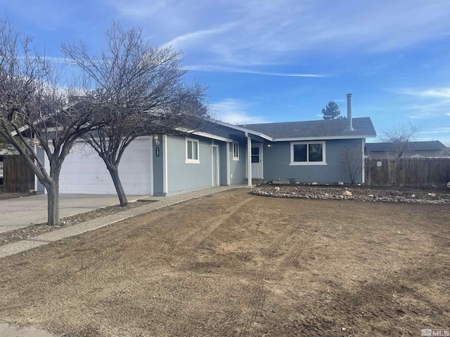 ranch-style house featuring a garage