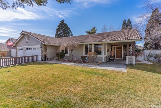 single story home with a front yard and a garage