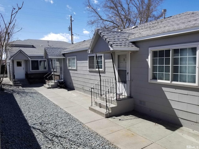 rear view of house featuring a patio area