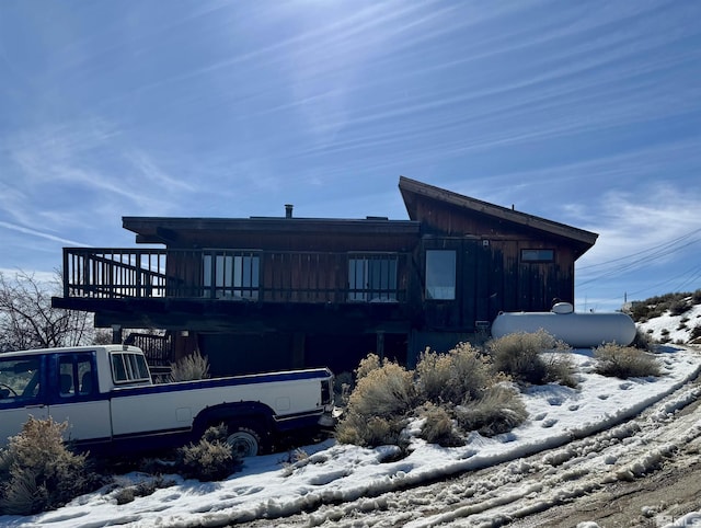 exterior space featuring a wooden deck