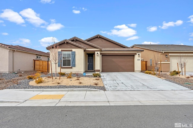 ranch-style home featuring a garage