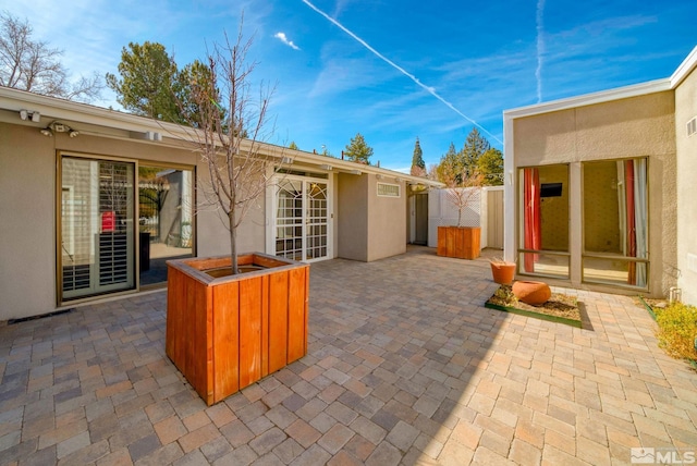 view of patio with fence