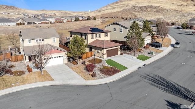 aerial view with a mountain view and a residential view