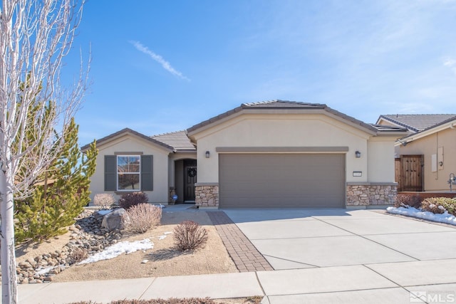 ranch-style home featuring a garage, stone siding, concrete driveway, and stucco siding