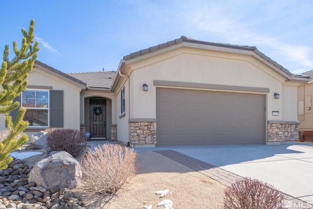 single story home with a garage, stone siding, concrete driveway, and stucco siding