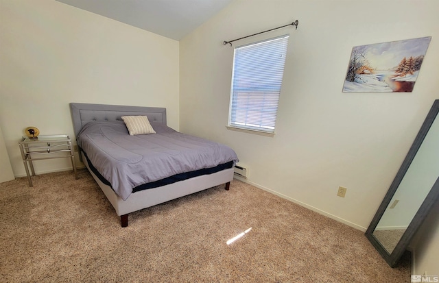 bedroom featuring carpet floors, a baseboard radiator, baseboards, and vaulted ceiling