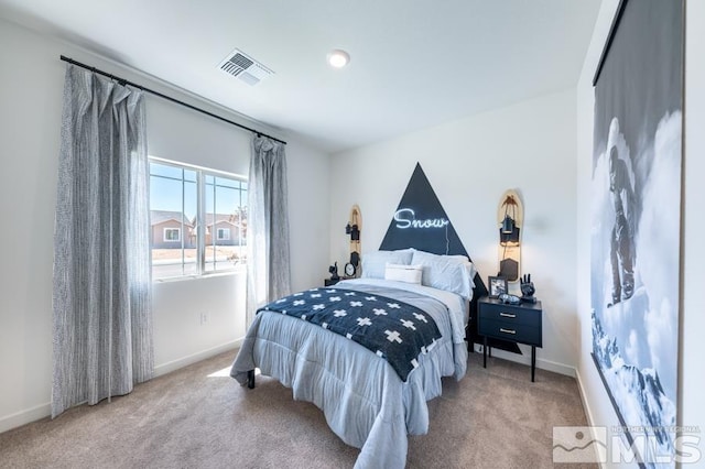 bedroom featuring carpet floors, baseboards, and visible vents