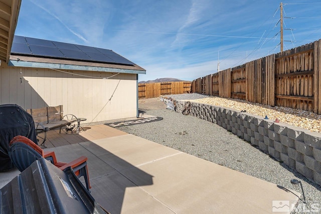 view of patio with a fenced backyard