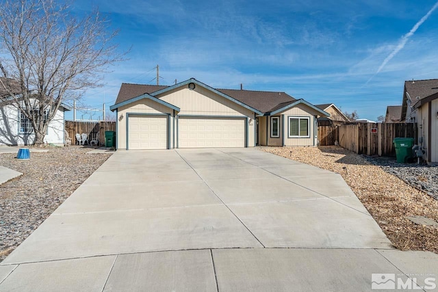 single story home with a garage, fence, and concrete driveway