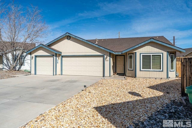 ranch-style house with a garage and concrete driveway