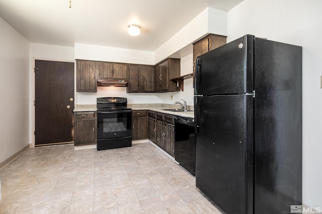 kitchen with dark brown cabinetry, under cabinet range hood, light countertops, black appliances, and a sink