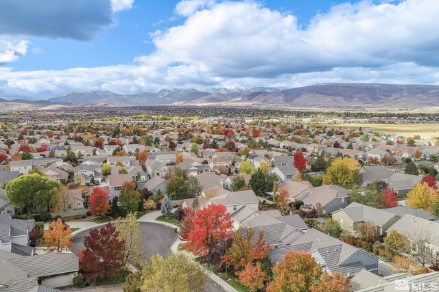 bird's eye view with a residential view and a mountain view