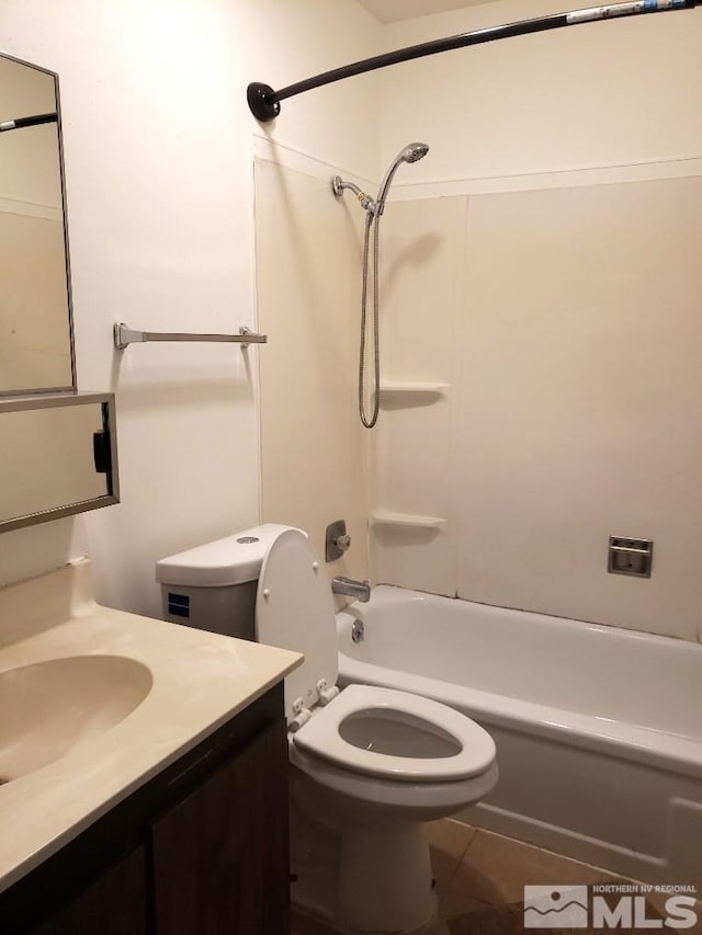 bathroom with toilet, tile patterned flooring, shower / washtub combination, and vanity