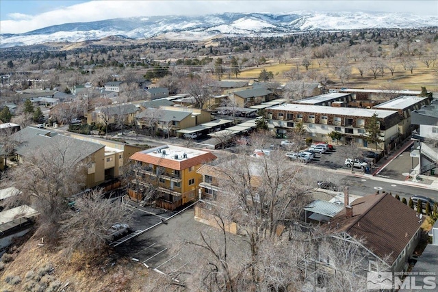 drone / aerial view featuring a mountain view