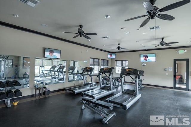 workout area featuring ornamental molding and visible vents