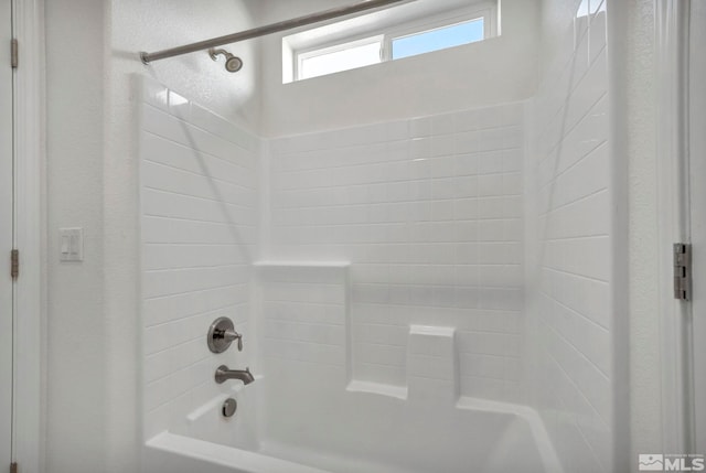 full bath featuring  shower combination