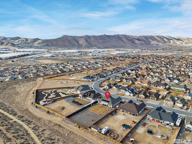 bird's eye view with a residential view and a mountain view