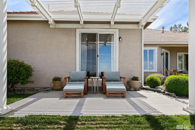 view of patio featuring a pergola