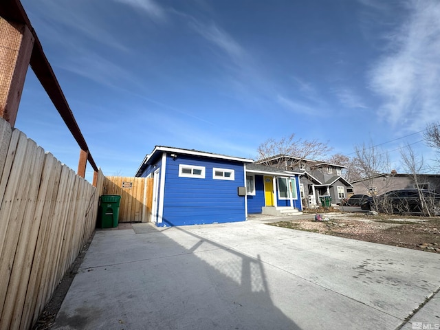 view of front of home with fence