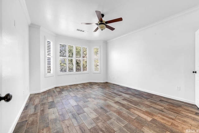 unfurnished room featuring baseboards, visible vents, ceiling fan, ornamental molding, and wood finished floors