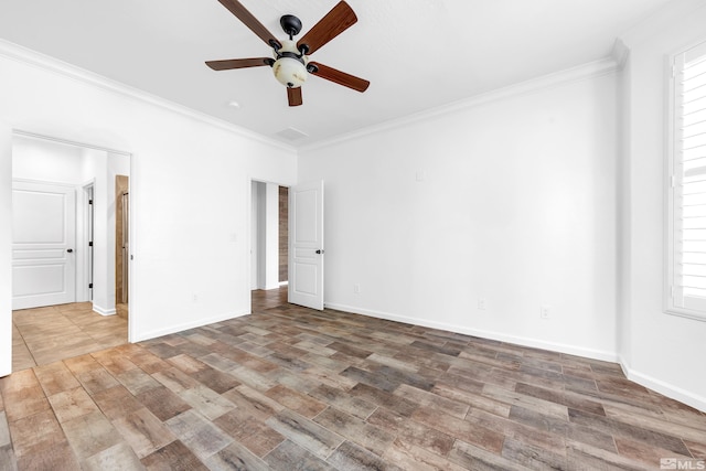 unfurnished bedroom featuring ornamental molding and wood finished floors