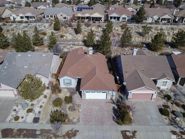 birds eye view of property with a residential view