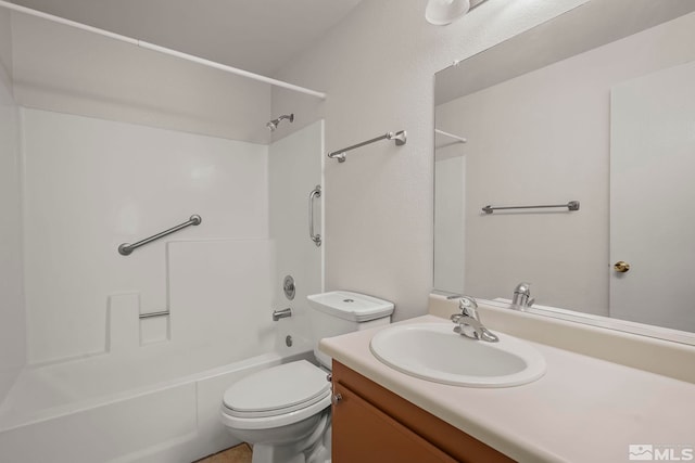 full bathroom with toilet, tub / shower combination, and vanity