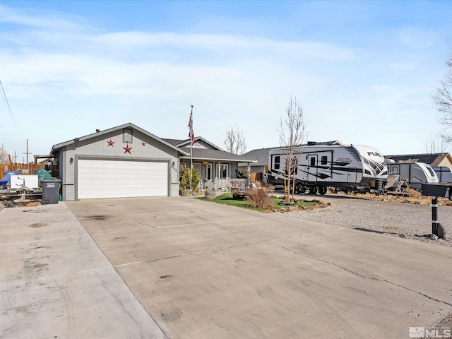 view of front of home featuring driveway and an attached garage